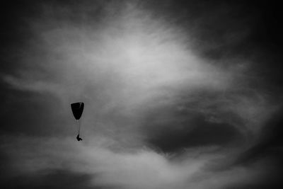 Low angle view of kite flying in sky