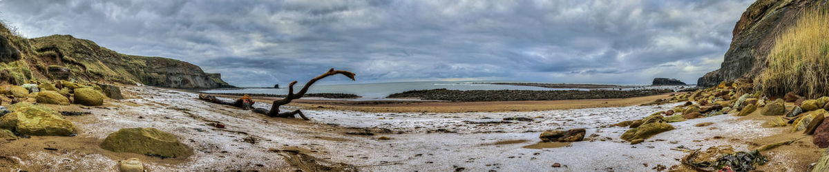 Panoramic shot of beach against sky