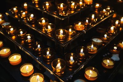 Row of illuminated lights at night