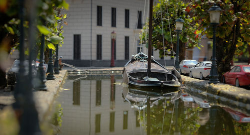 Canal amidst buildings in city