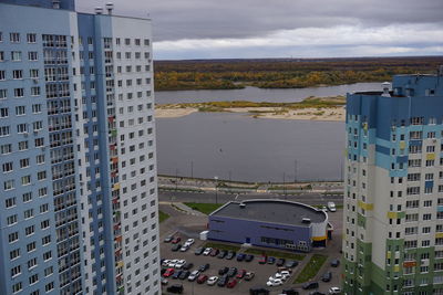 High angle view of buildings in city against sky