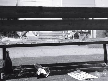 High angle view of railroad tracks seen through glass