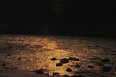 Scenic view of sea at night