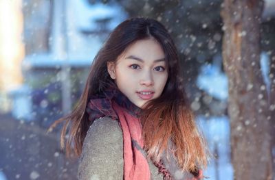 Portrait of girl standing outdoors