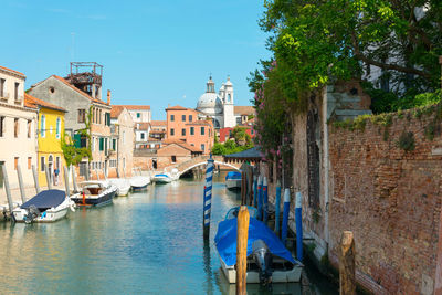 View of canal along buildings