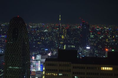 Illuminated cityscape at night