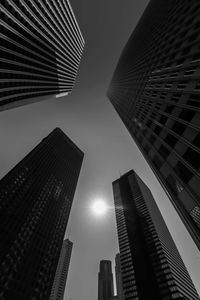 Low angle view of buildings in city against sky