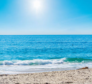 Scenic view of sea against clear sky