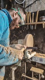 Male carpenter working in workshop