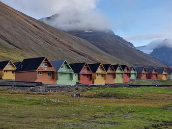 House on field against sky