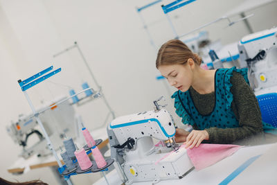 Woman working in sewing factory