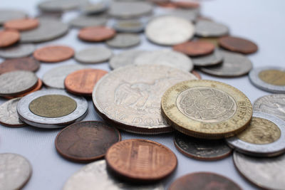 High angle view of coins on table