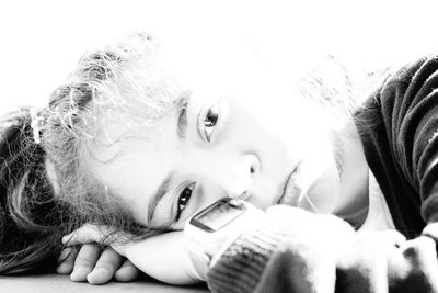 Close-up portrait of a smiling young woman