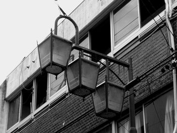 Street lamps in cityscape