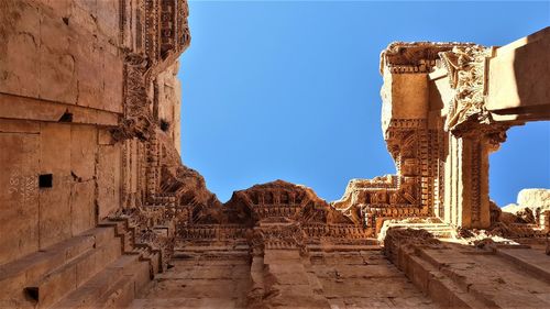 Old ruins of temple against clear sky