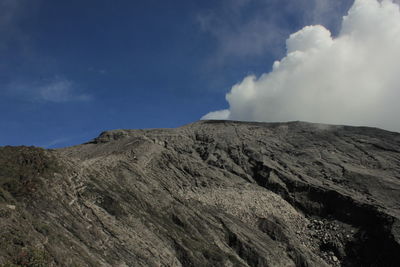 Scenic view of volcanic landscape against sky