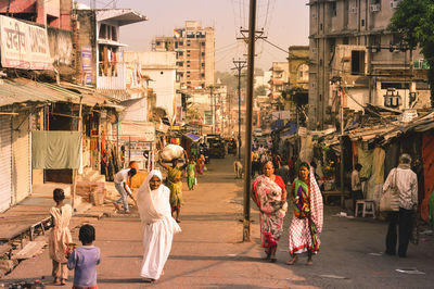 People on street in city