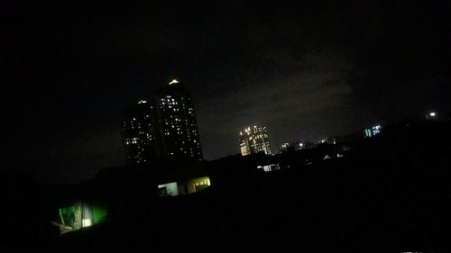 Illuminated cityscape at night