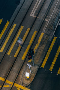 Low section of man walking on street