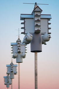 Low angle view of street light against clear sky