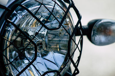 Close-up of motorcycle headlight