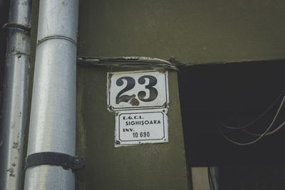 Close-up of pipes against wall