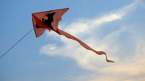 Low angle view of flag against sky