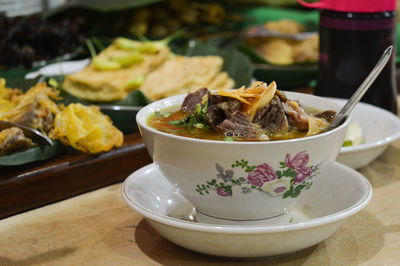 Close-up of food served on table