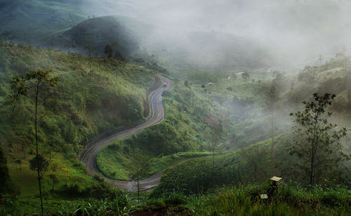 Scenic view of mountains during foggy weather