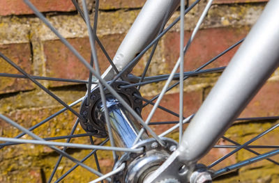 High angle view of bicycle wheel against wall