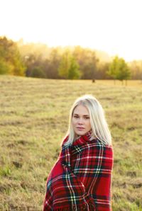 Portrait of young woman in park