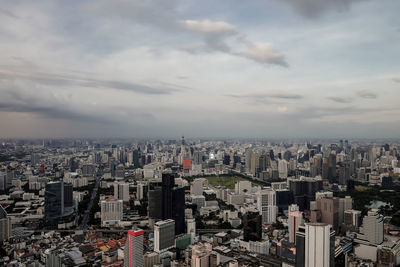 High angle view of buildings against sky in city