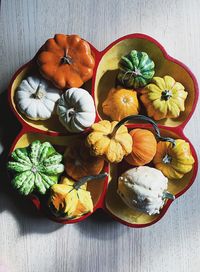 High angle view of various pumpkins on table