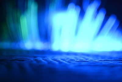 Close-up of illuminated water at night