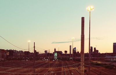 View of illuminated city at sunset