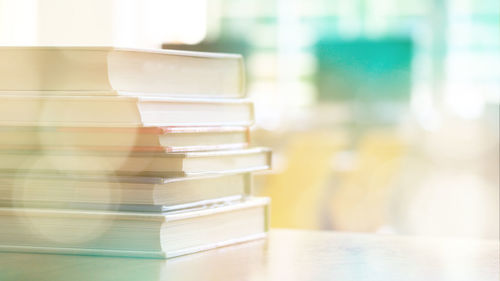 Close-up of books on table in library