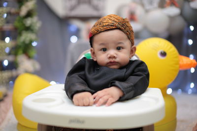 Baby boy on a javanese traditional clothes