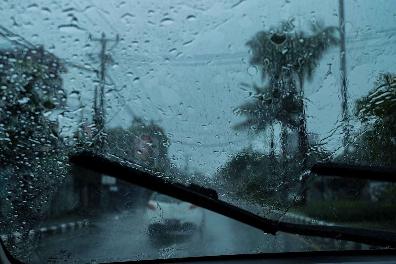 RAINDROPS ON GLASS WINDOW