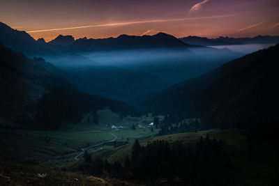 Scenic view of mountains against sky during sunset