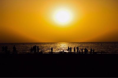 Scenic view of sea at sunset