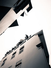 Low angle view of buildings against clear sky