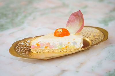 Close-up of thai cake in plate on table