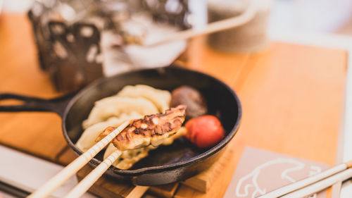 High angle view of meat in plate on table