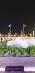 View of illuminated street at night