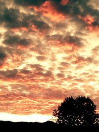 Low angle view of dramatic sky during sunset