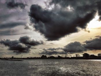 Scenic view of dramatic sky over sea