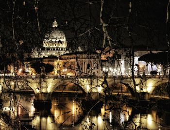 Illuminated building in city at night