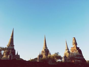 Old ruins of buddhist temple against clear sky