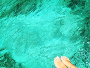 Low section of person in water