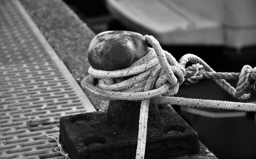 Close-up of rope tied to cleat